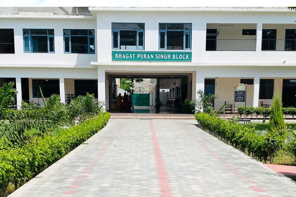 Bhagat Puran Singh Block with the main driveway and lawns