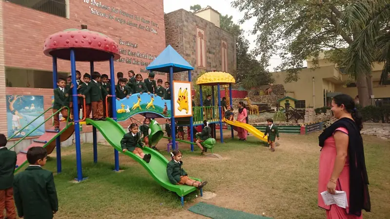 Swings and slides in the kindergarten play area