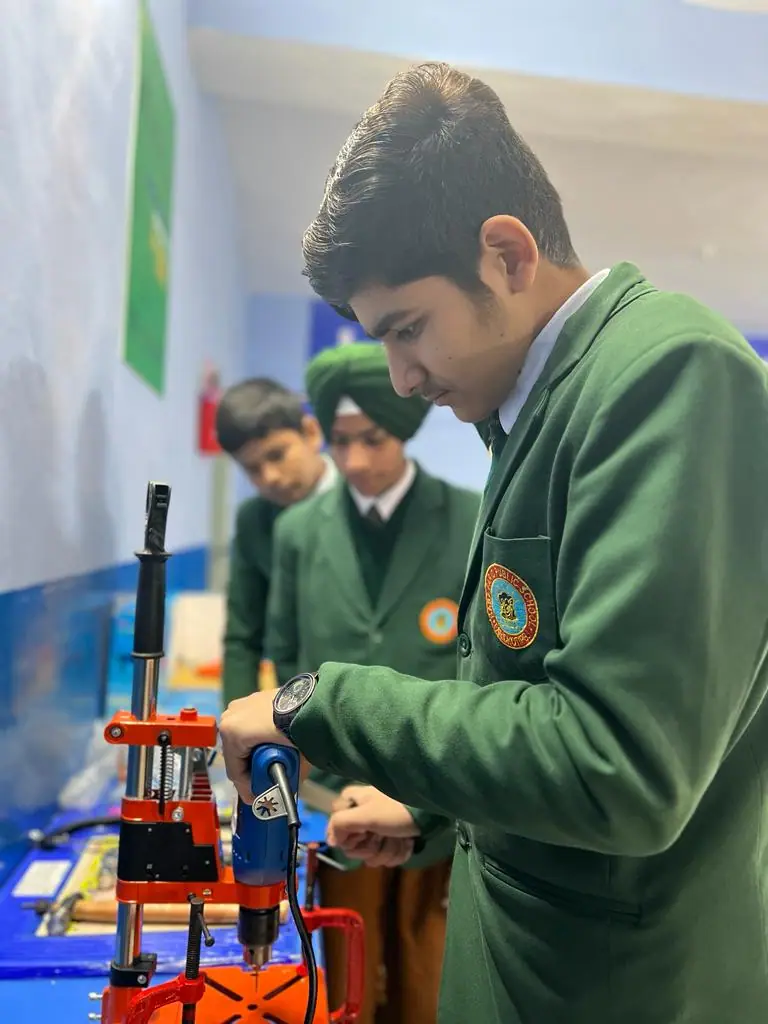 A student working on an electronics project in the Atal Tinkering Lab